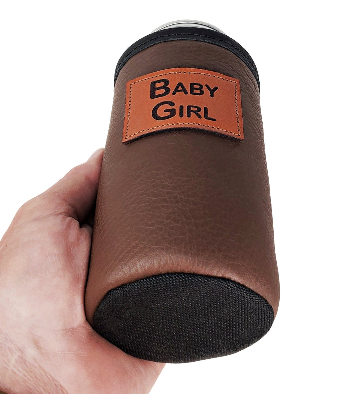Angled view of brown leather 16oz can cooler with Baby Girl engraved patch and black reinforced bottom