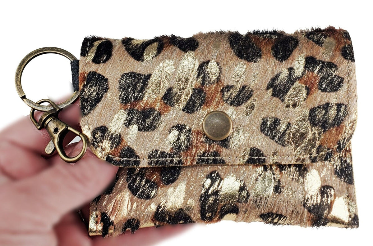Leopard-gold acid-wash cowhide mini card wallet keychain with brass-tone snap and swivel clip
