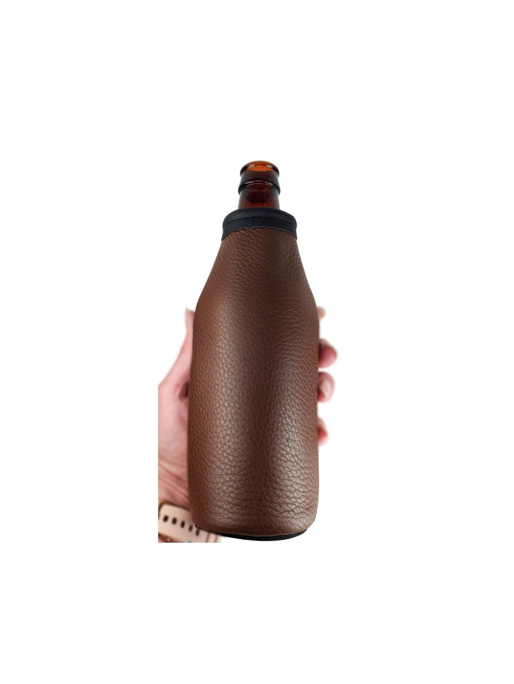 Hand holding a chocolate leather beer bottle holder on a long-neck bottle