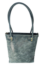 Back view of Madison distressed sage leather tote showing rolled shoulder handles, brass rivets, and reinforced base