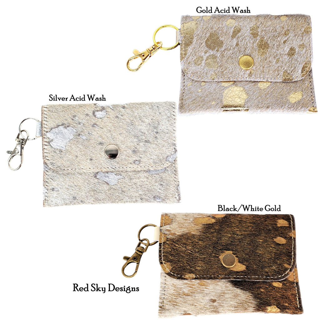 Three acid-wash cowhide wallet examples labeled gold acid wash, silver acid wash and black-white gold