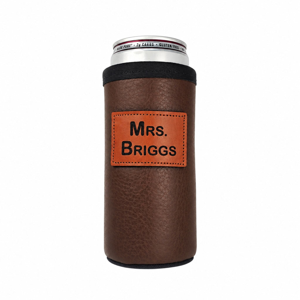 Brown leather 12 oz slim can holder with a personalized Mrs. Briggs engraved patch