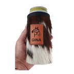 Dark cowhide slim can holder engraved with a horse design and the name GINA, shown in hand