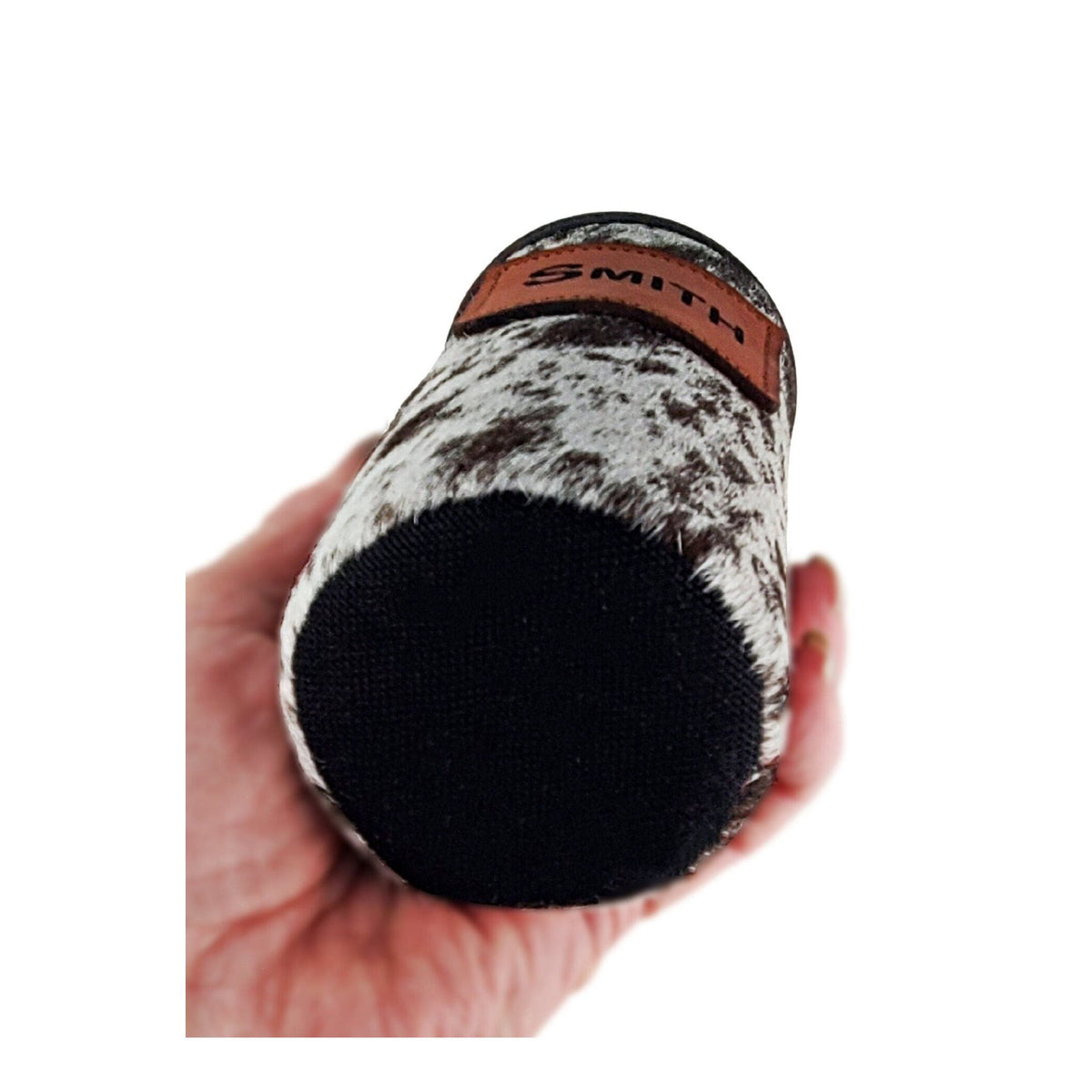 Engraved cowhide slim can holder shown from below with its black ballistic nylon base